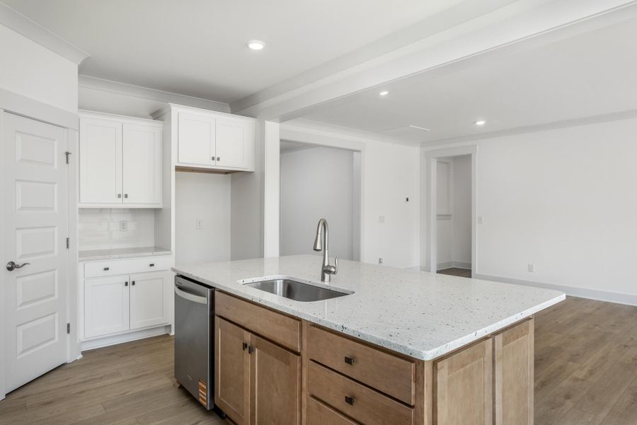 Furnished interior view inside a new home in The Enclave at Hidden Lake - 55+ Community, Youngsville (Image 10).