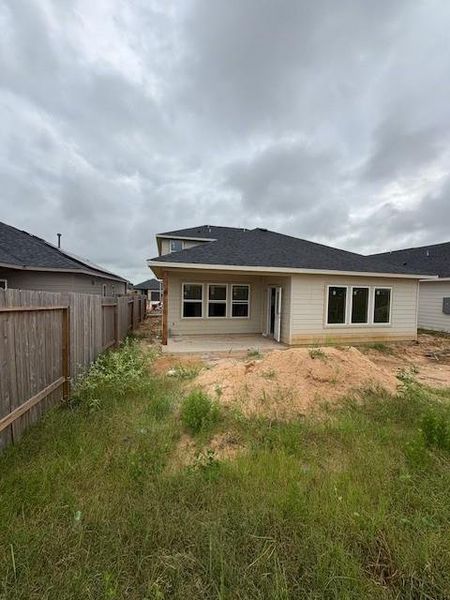 Front exterior of a new home in Bluestem, Brookshire, TX, highlighting curb appeal (Image 13). Front exterior of a new home in Bluestem, Brookshire, TX, highlighting curb appeal (Image 13).
