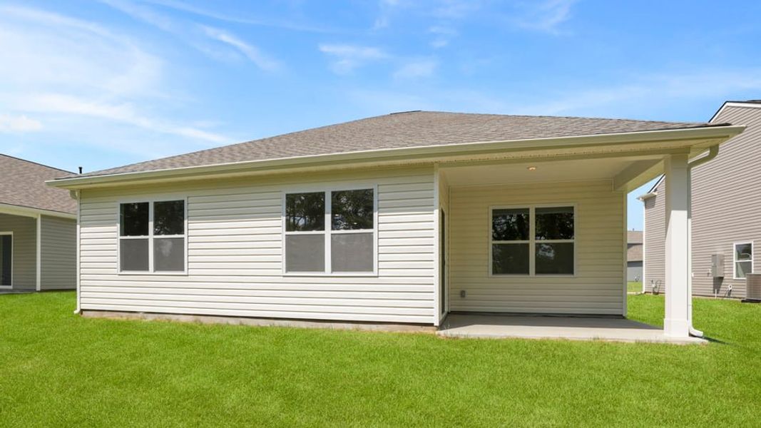 Exterior details and patio area of a home in Sherwood Gardens, Landrum (Image 22).