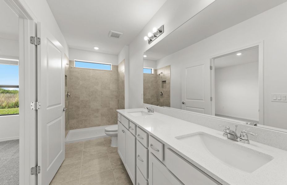 Furnished interior view inside a new home in Whispering Lakes, Lehigh Acres (Image 6).