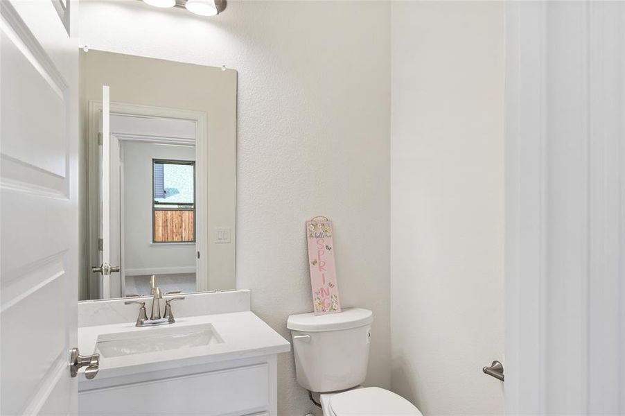 Furnished interior view inside a new home in Stone River Glen, Royse City (Image 11).