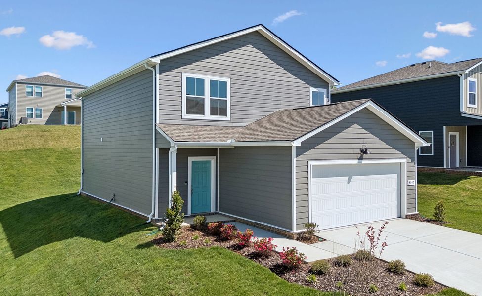 Front exterior of a new home in Independence at Carter's Station, Columbia, TN, highlighting curb appeal (Image 18).