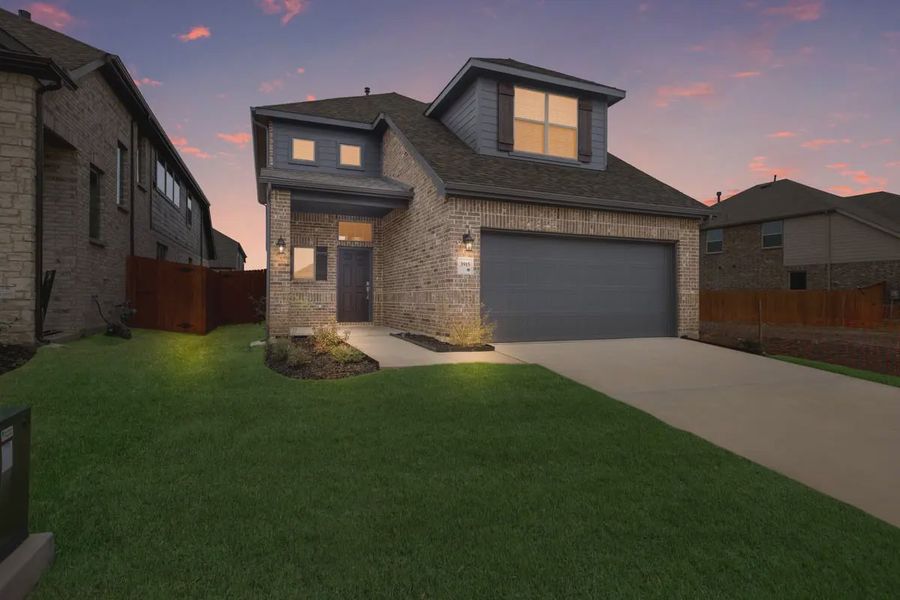Representative exterior photo of a completed home built from the Chicago by Chesmar Homes in Heartland 40's, Heartland, TX (Image 19).