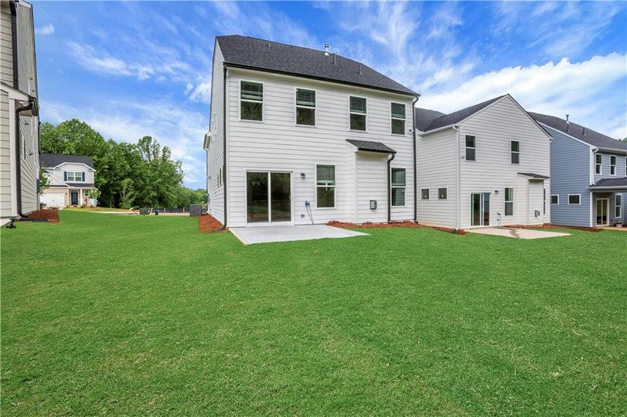 Exterior details and patio area of a home in Villas at Dawsonville, Dawsonville (Image 4).