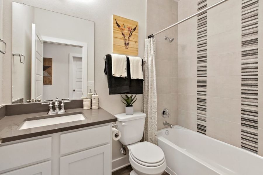 Furnished interior view inside a new home in Village At Manor Commons, Manor (Image 8).
