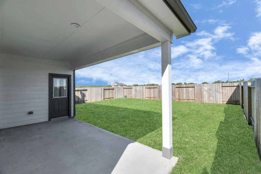 Experience outdoor living at its finest on this expansive covered patio, thoughtfully designed for BBQs and delightful outdoor dining. Experience outdoor living at its finest on this expansive covered patio, thoughtfully designed for BBQs and delightful outdoor dining.