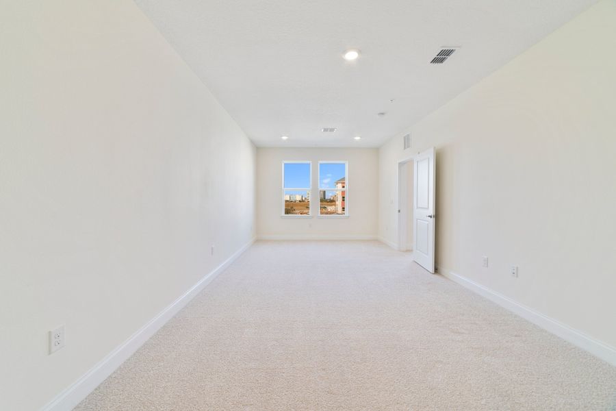 Spacious, unfurnished interior of a new home in Gatherings® of Lake Nona, Orlando (Image 22).