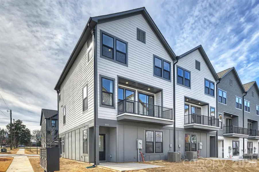 Front exterior of a new home in , Charlotte, NC, highlighting curb appeal (Image 2). Front exterior of a new home in , Charlotte, NC, highlighting curb appeal (Image 2).