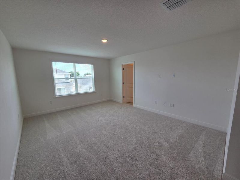 Spacious, unfurnished interior of a new home in Villamar, Winter Haven (Image 39).