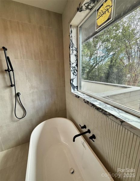 Primary bath custom window trim detail