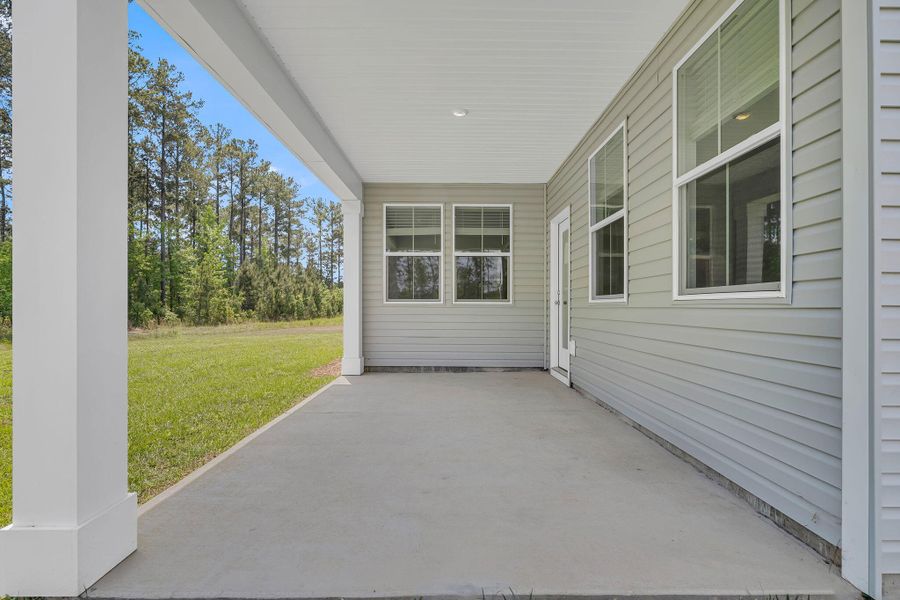 Exterior details and patio area of a home in Wildcat Chase, Summerville (Image 20).