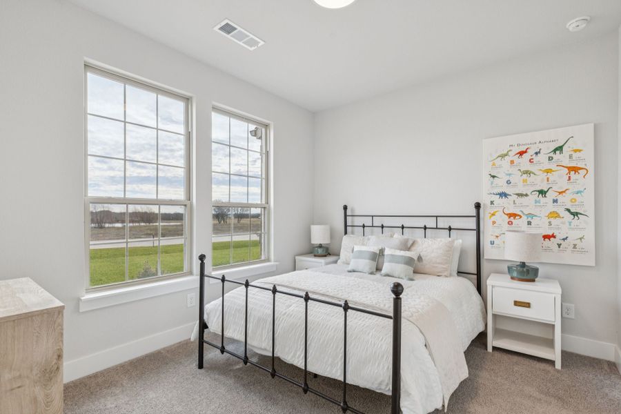 Representative furnished interior of a home built from the Emerson by Centre Living Homes in Lakeway Estates, Waxahachie (Image 22).