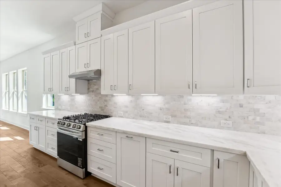 Marble Counters * Marble Backsplash * Under Cabinet Lighting. Marble Counters * Marble Backsplash * Under Cabinet Lighting.