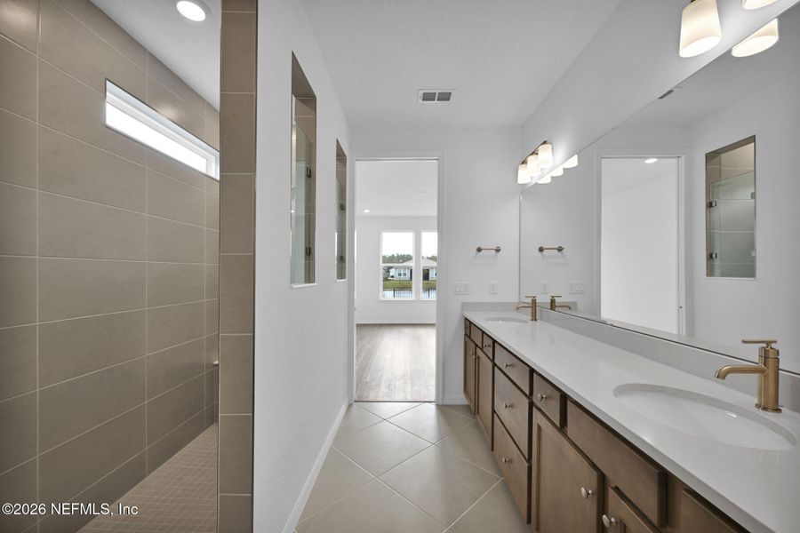 Furnished interior view inside a new home in Summer Bay at Grand Oaks, St. Augustine (Image 10).