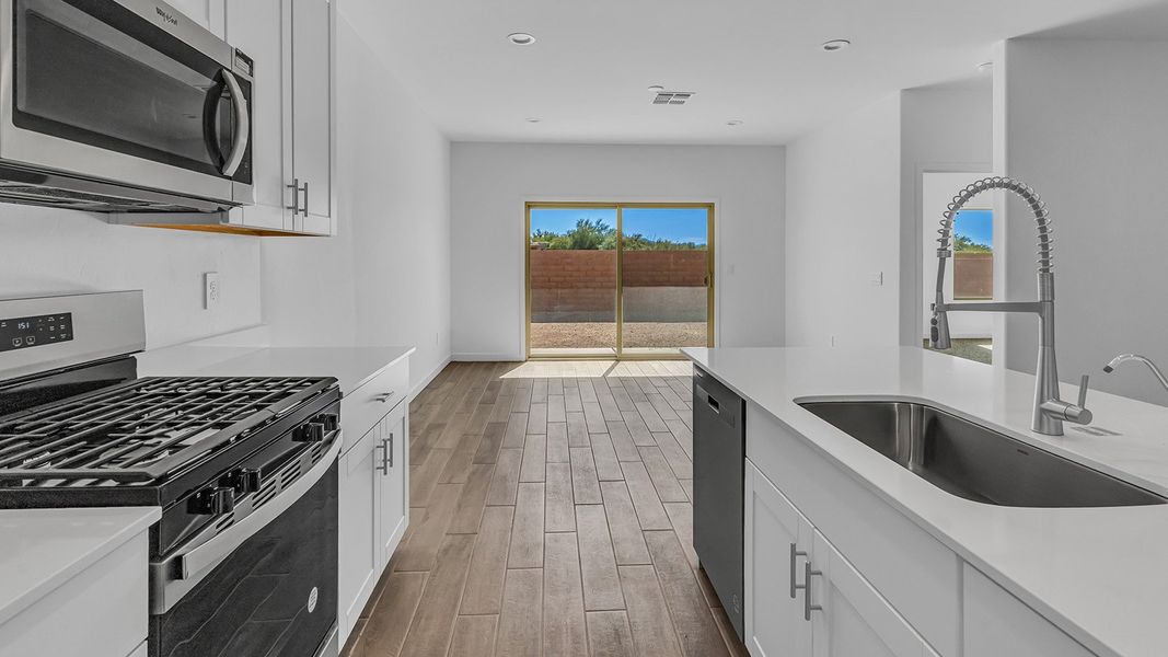 Representative furnished interior of a home built from the Harris by D.R. Horton in The Oasis at Rocking K, Vail (Image 13).
