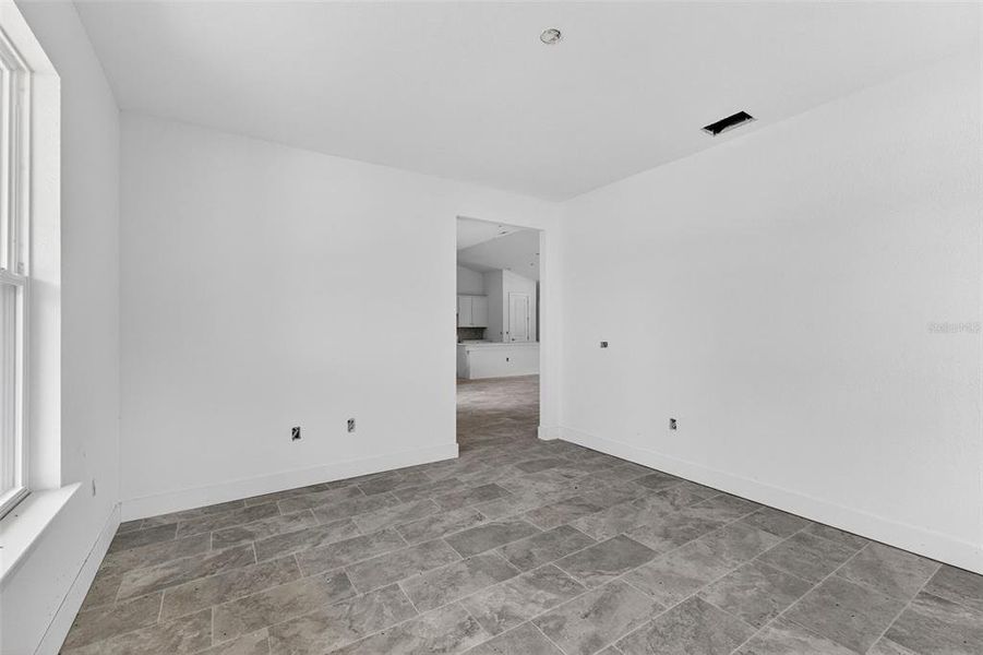 Spacious, unfurnished interior of a new home in , Port Charlotte (Image 24).