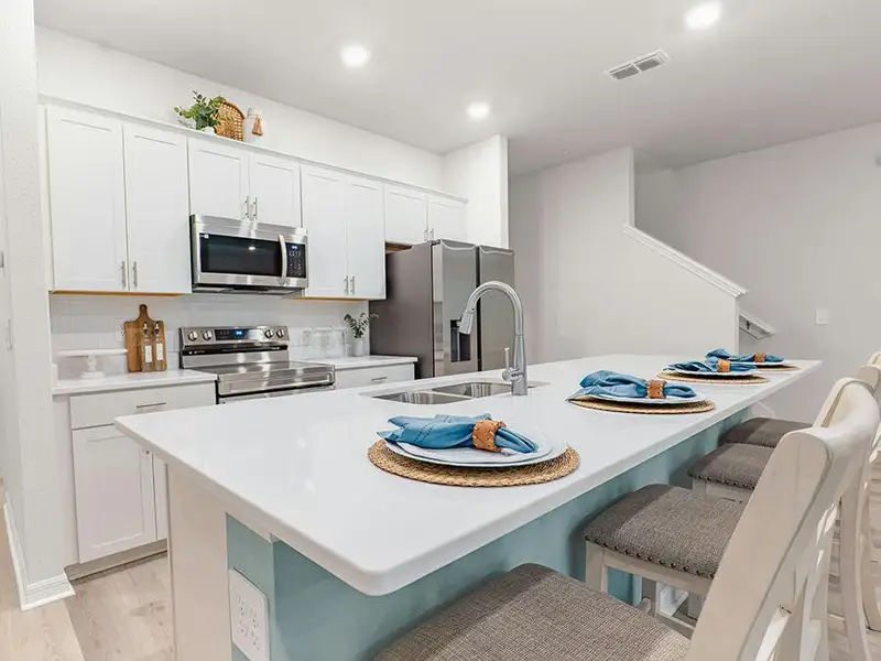 Brand-new open layout townhome for sale in St. Cloud, FL, with a 2-car garage!