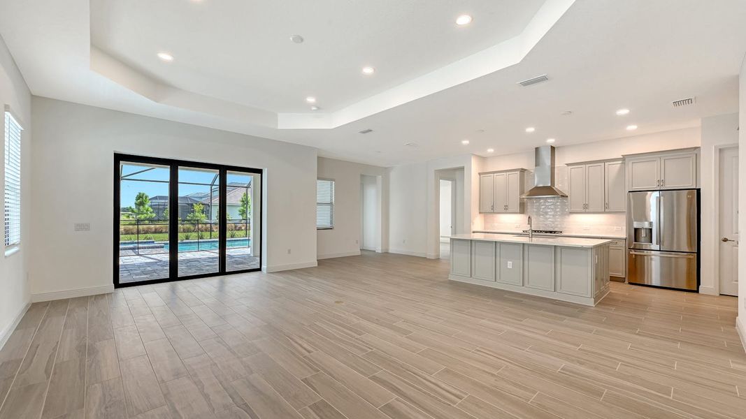 Spacious, unfurnished interior of a new home in Palm Grove Real Estate and Homes for Sale in Lakewood Ranch, FL - Neal Communities, Bradenton (Image 12).