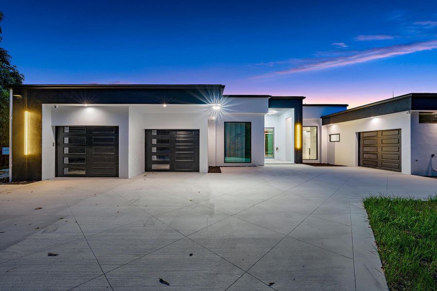 Front exterior of a new home in , Jupiter, FL, highlighting curb appeal (Image 2). Front exterior of a new home in , Jupiter, FL, highlighting curb appeal (Image 2).
