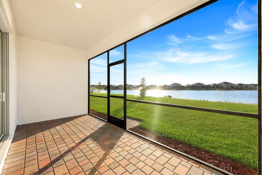 Exterior details and patio area of a home in Hampton Lakes at River Hall, Alva (Image 4).