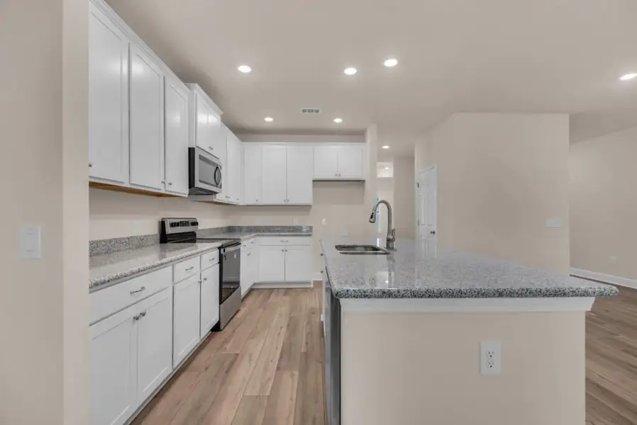 Representative furnished interior of a home built from the Rosemary by Holiday Builders in Sanborn Hill, Milton (Image 3). Representative furnished interior of a home built from the Rosemary by Holiday Builders in Sanborn Hill, Milton (Image 3).