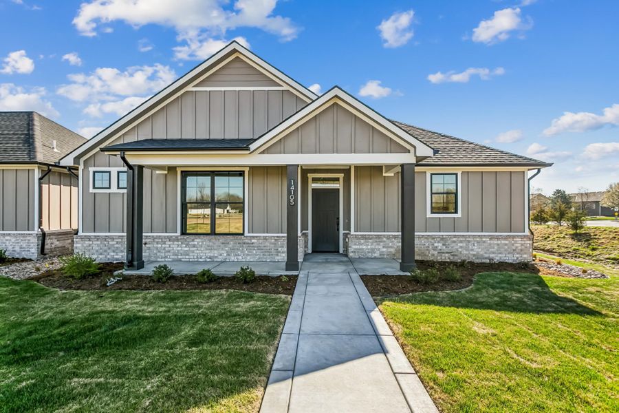 Front exterior of a new home in The Courtyards at Jacobs Farm, Wichita, KS, highlighting curb appeal (Image 1). Front exterior of a new home in The Courtyards at Jacobs Farm, Wichita, KS, highlighting curb appeal (Image 1).