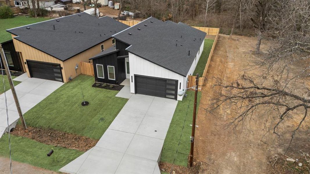Front exterior of a new home in , Dallas, TX, highlighting curb appeal (Image 26).