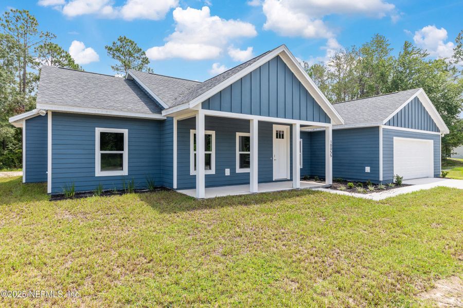 Front exterior of a new home in , Hampton, FL, highlighting curb appeal (Image 20).