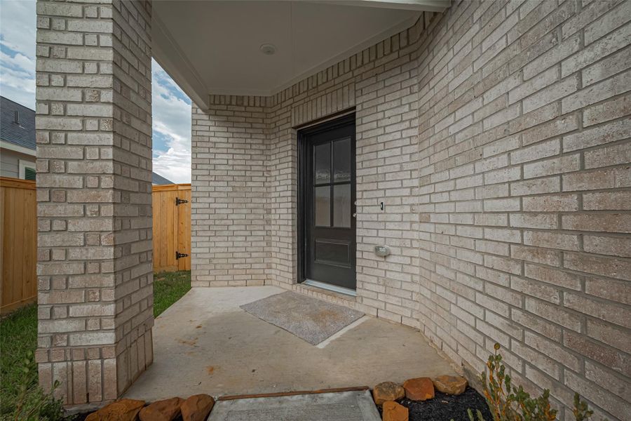 Exterior details and patio area of a home in La Segarra, Brookshire (Image 3).