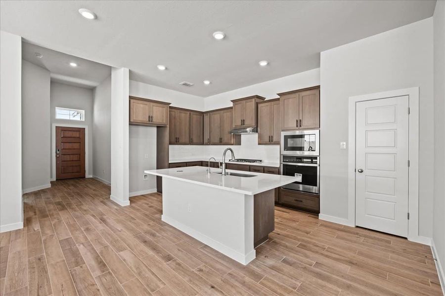 Furnished interior view inside a new home in Trace, San Marcos (Image 11).