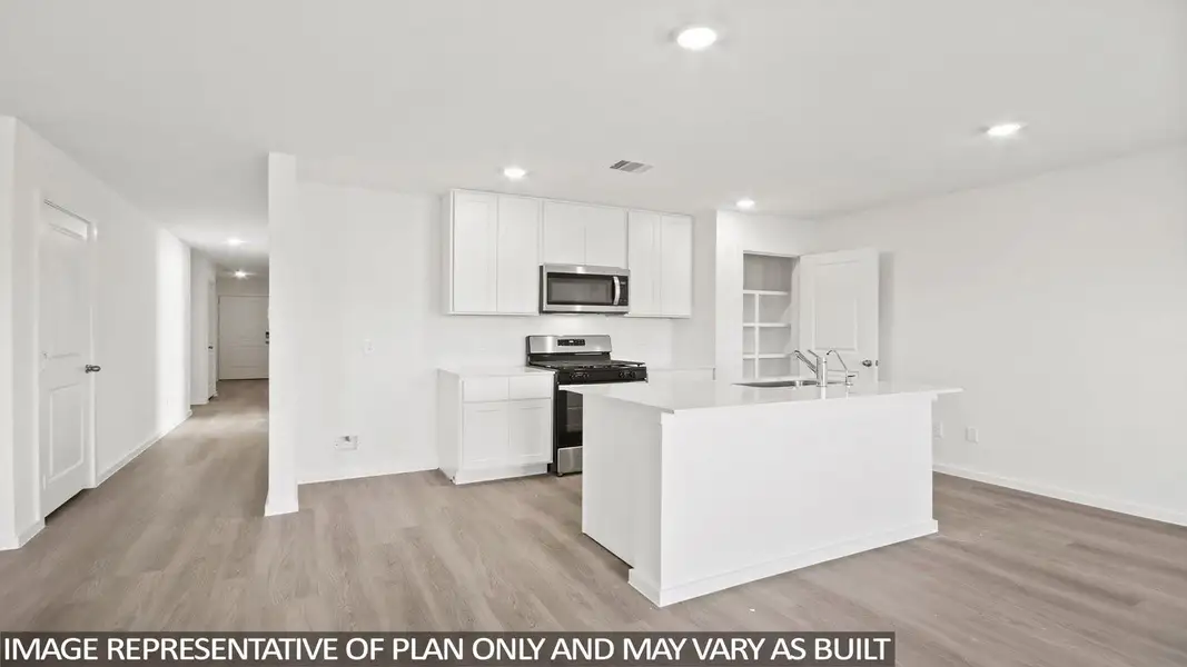 Furnished interior view inside a new home in Sunterra, Katy (Image 3).
