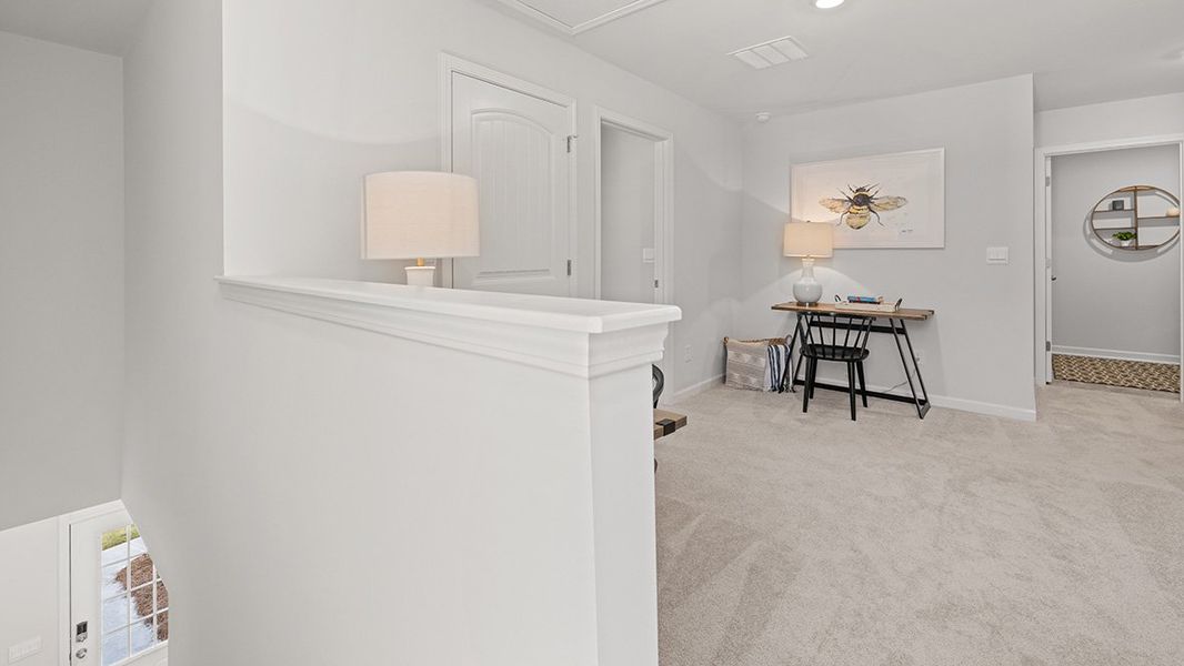 Representative furnished interior of a home built from the ROBIE by D.R. Horton in Palisades, Dallas (Image 19).