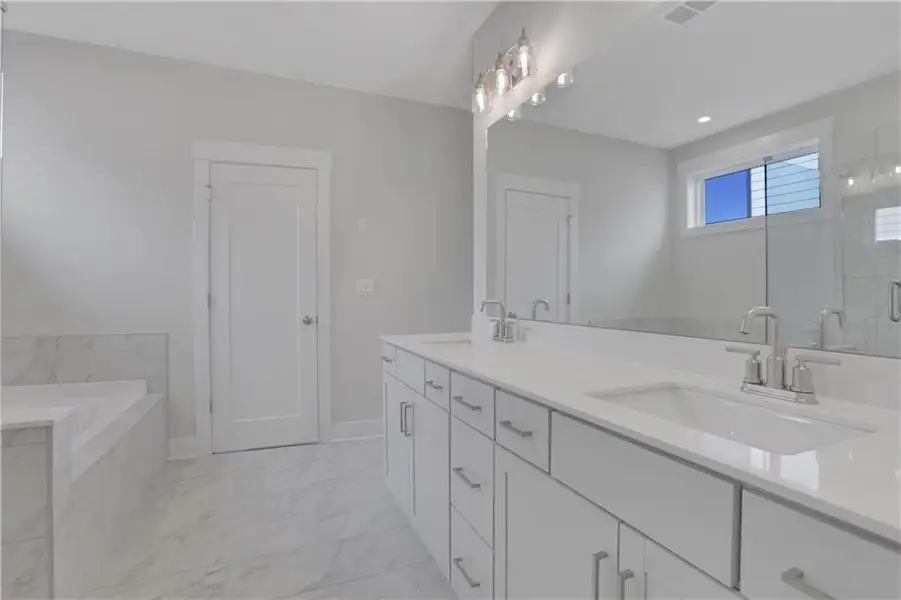 Furnished interior view inside a new home in The Paddocks at Doc Hughes, Buford (Image 7).