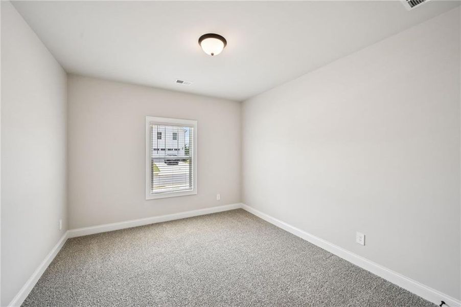 Spacious, unfurnished interior of a new home in Vines at Mill Creek - Legacy Series, Braselton (Image 37).