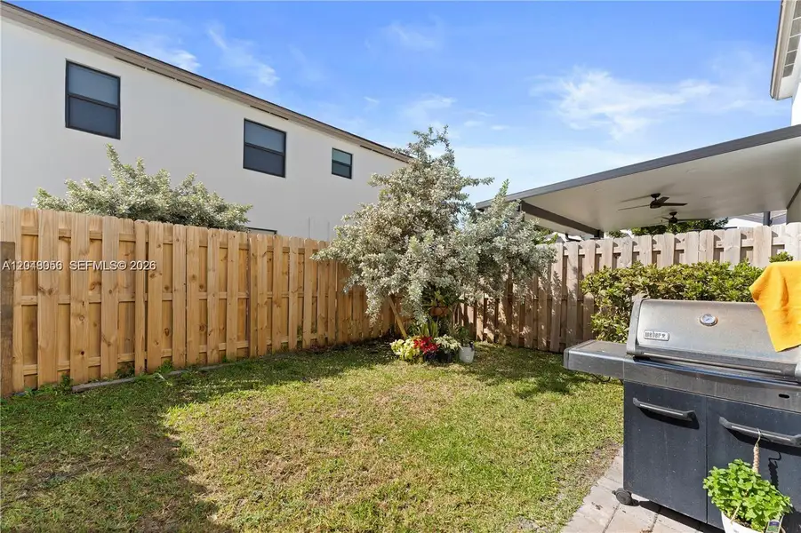 Exterior details and patio area of a home in , Miami (Image 15). Exterior details and patio area of a home in , Miami (Image 15).