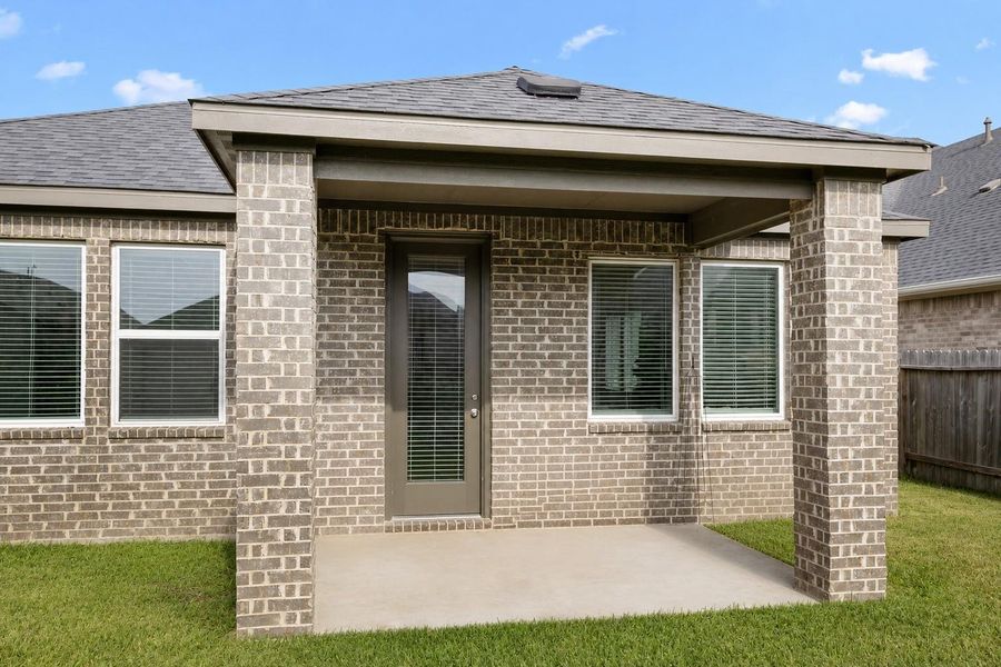 Exterior details and patio area of a home in Morgan's Landing 50s, La Porte (Image 3).