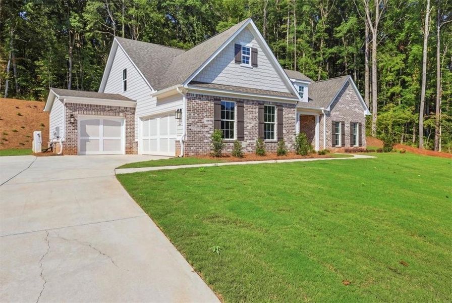 Front exterior of a new home in Bradley Gin, Monroe, GA, highlighting curb appeal (Image 29).