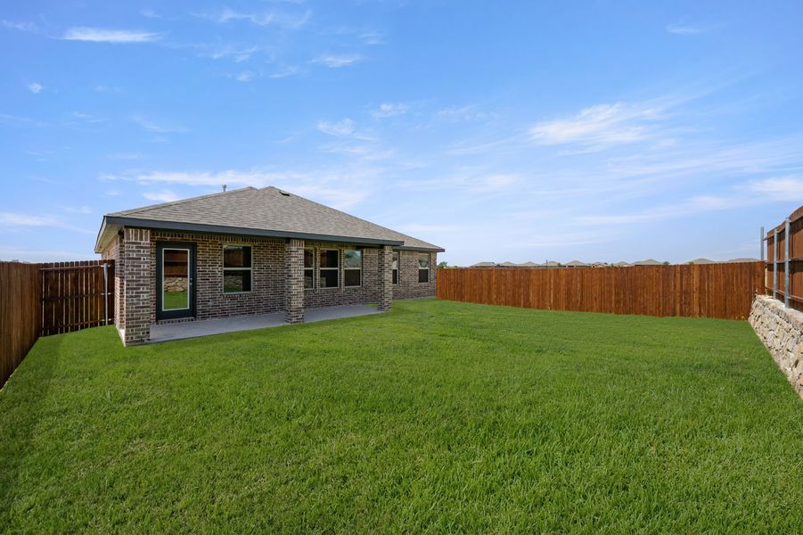 Front exterior of a new home in Baker Farms, Cleburne, TX, highlighting curb appeal (Image 25). Front exterior of a new home in Baker Farms, Cleburne, TX, highlighting curb appeal (Image 25).