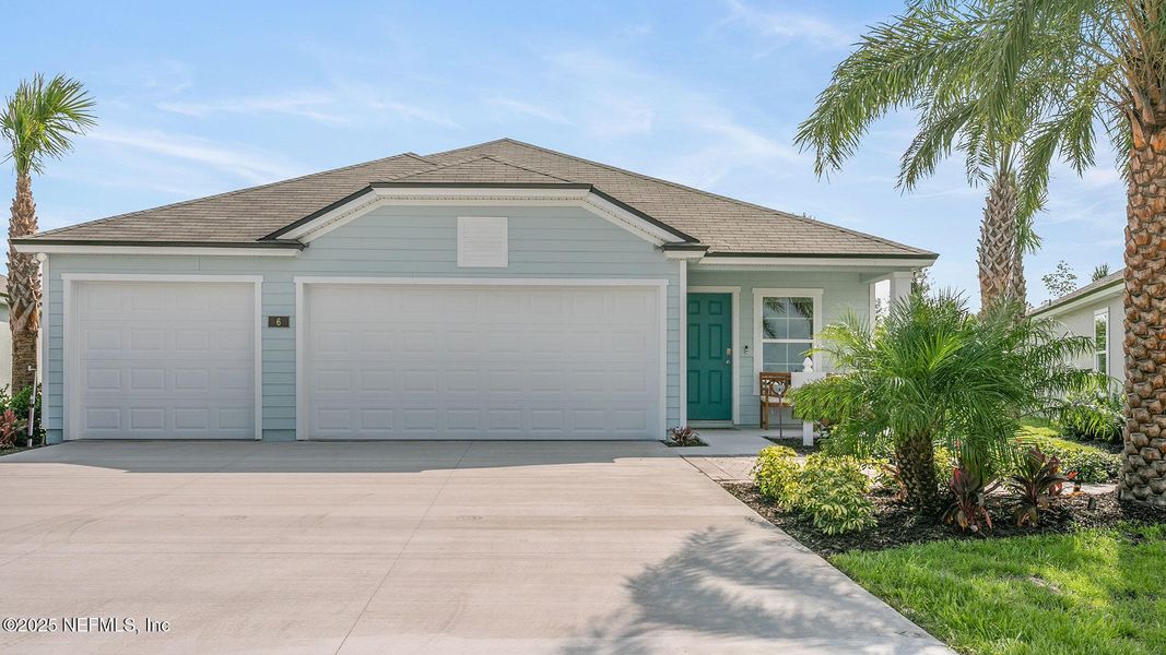 Front exterior of a new home in Sawmill Branch Express, Palm Coast, FL, highlighting curb appeal (Image 2). Front exterior of a new home in Sawmill Branch Express, Palm Coast, FL, highlighting curb appeal (Image 2).