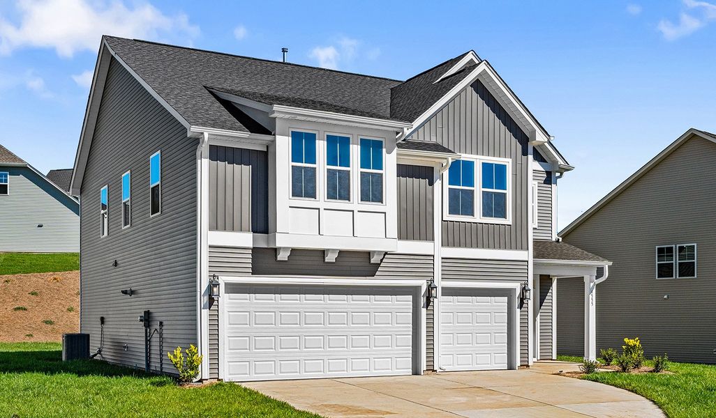 Front exterior of a new home in Hanes Lake, Winston-Salem, NC, highlighting curb appeal (Image 2).