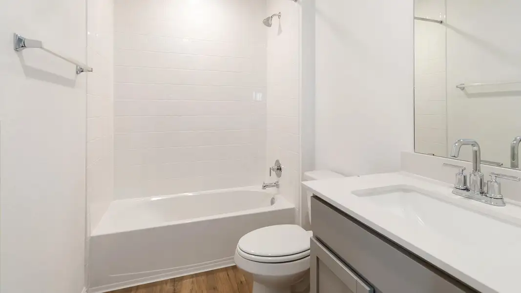 Furnished interior view inside a new home in Bar W Ranch, Leander (Image 9).