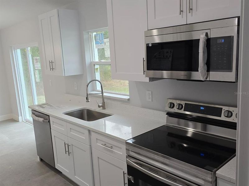 Furnished interior view inside a new home in , Dunnellon (Image 3).