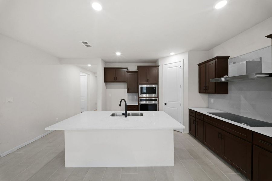 Furnished interior view inside a new home in Alberta Heights, Edinburg (Image 6).