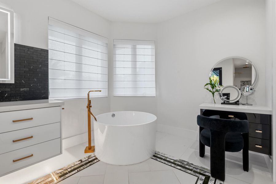 Her Primary Bathroom