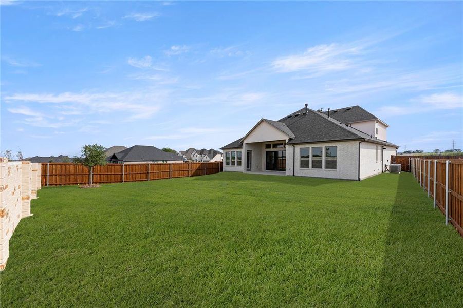 Exterior details and patio area of a home in Trinity Falls 60, McKinney (Image 3).