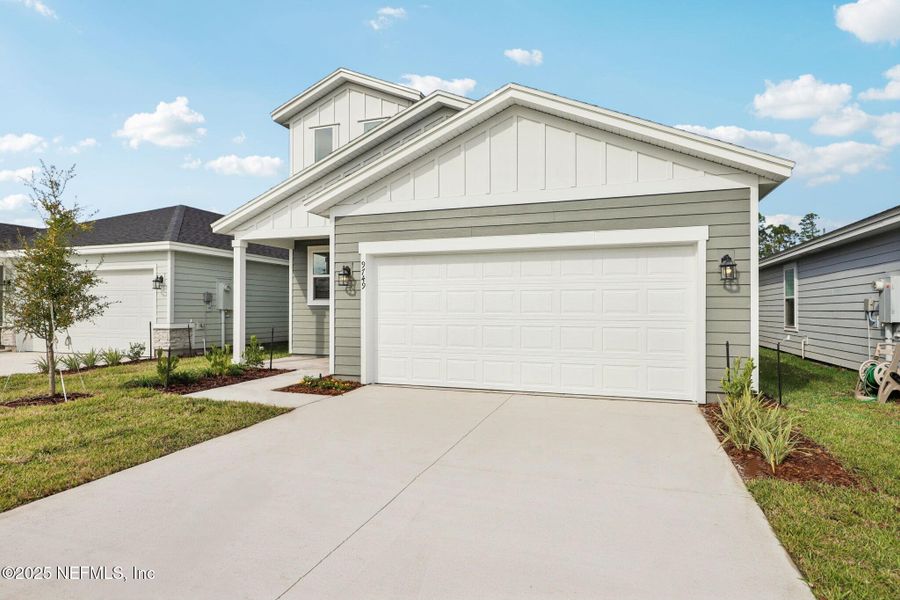 Front exterior of a new home in Cypress Meadows - Classic Series, Jacksonville, FL, highlighting curb appeal (Image 19).