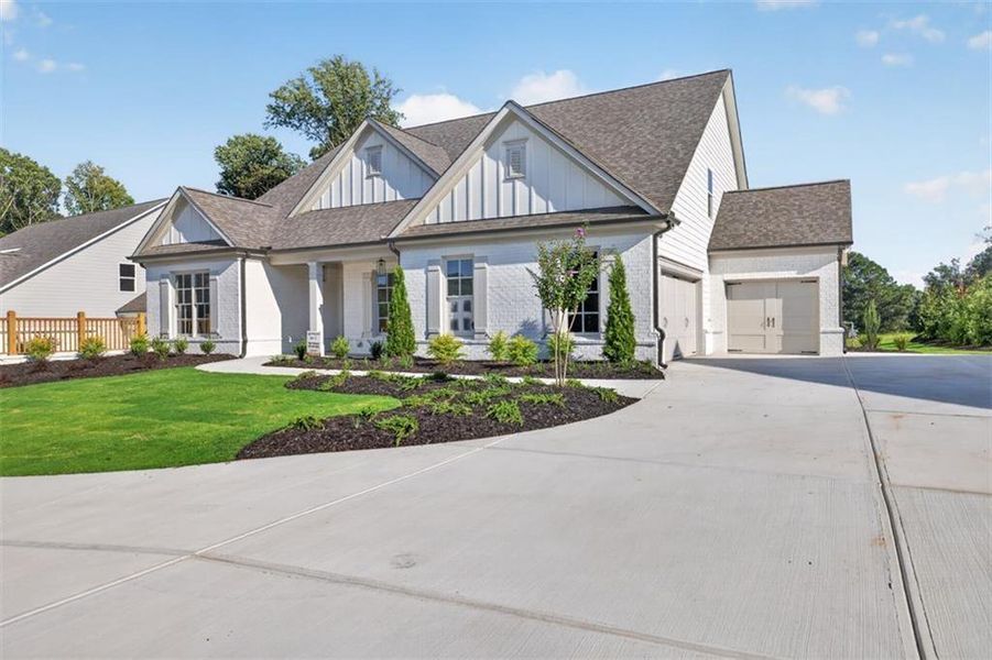 Front exterior of a new home in , Gainesville, GA, highlighting curb appeal (Image 29).