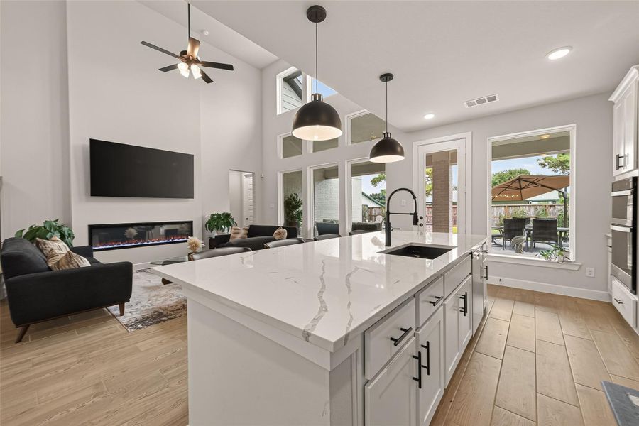 Large quartz island with plenty of workspace Large quartz island with plenty of workspace