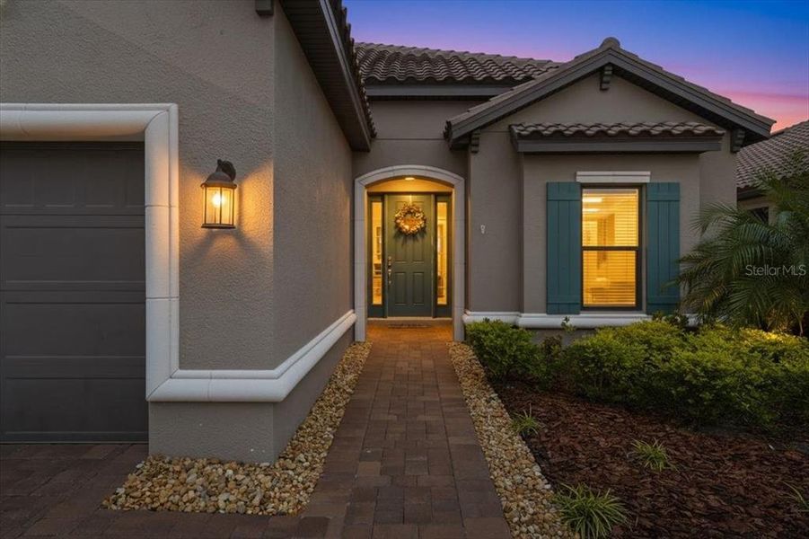 Exterior details and patio area of a home in Esplanade at Artisan Lakes, Palmetto (Image 27).