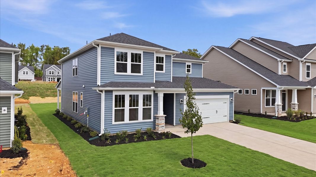 Front exterior of a new home in The Reserve at Livingston Park, Easley, SC, highlighting curb appeal (Image 20).
